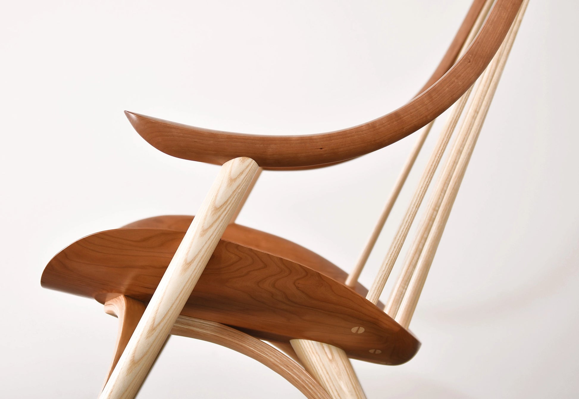 Wooden rocking chair with a white background