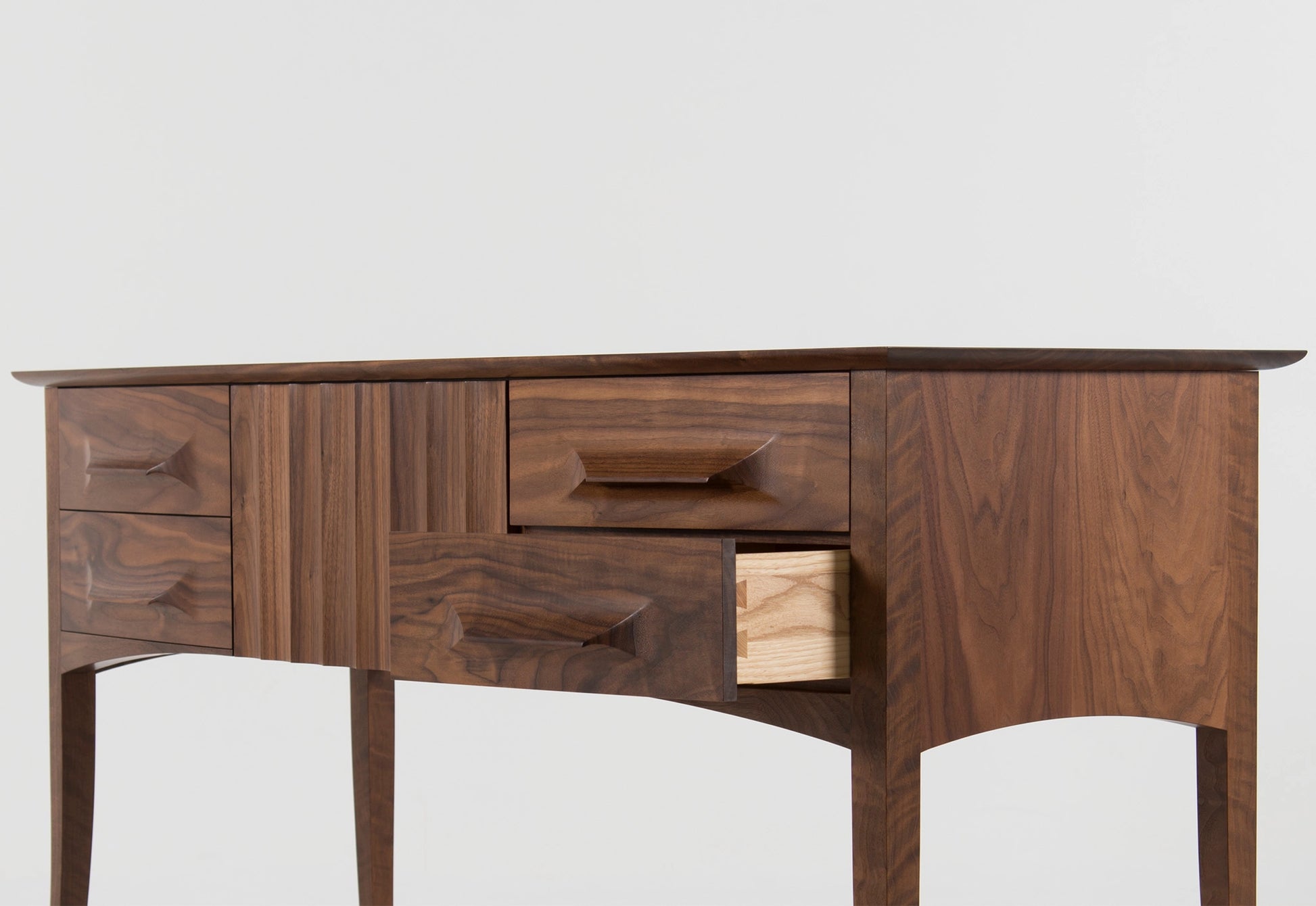 Wooden sideboard with drawers on a white background