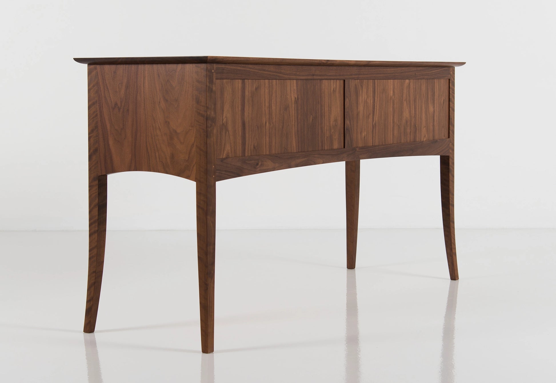 Wooden sideboard with drawers on a white background
