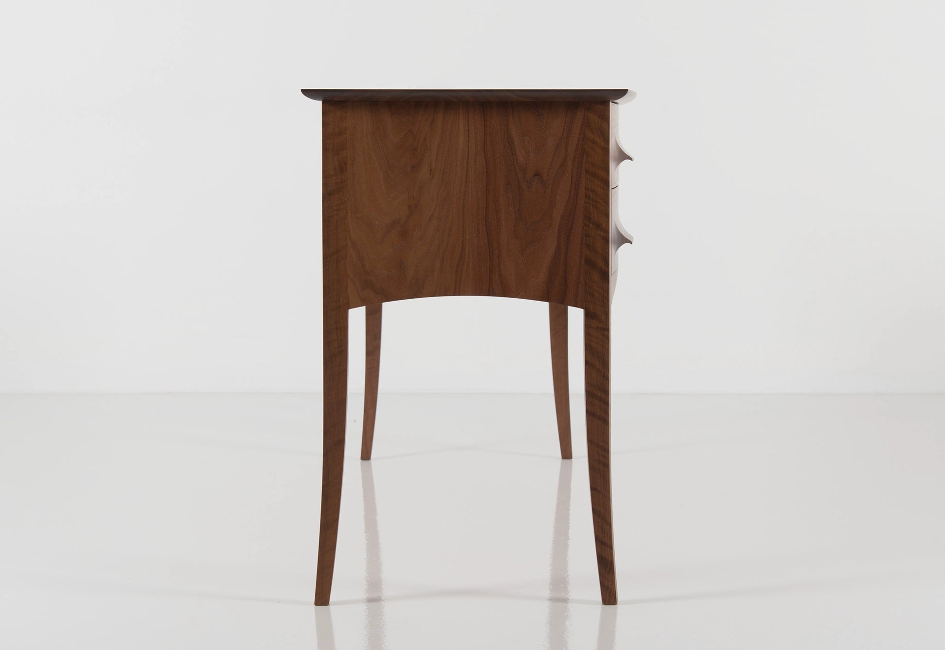 Wooden sideboard with drawers on a white background