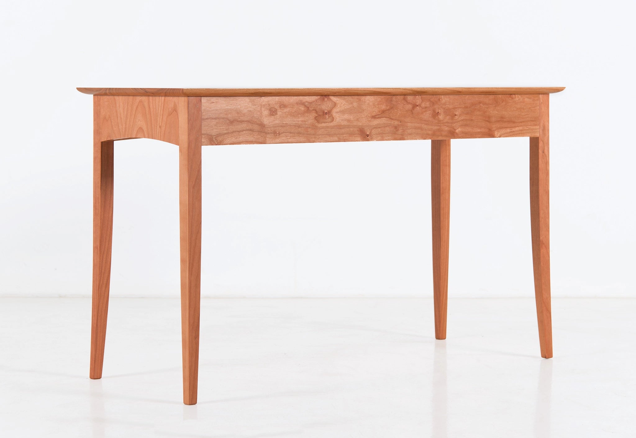 Wooden desk on a white background
