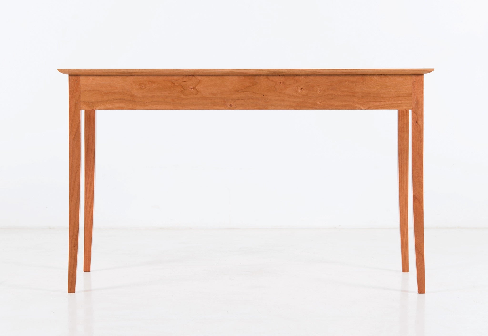 Wooden desk on a white background