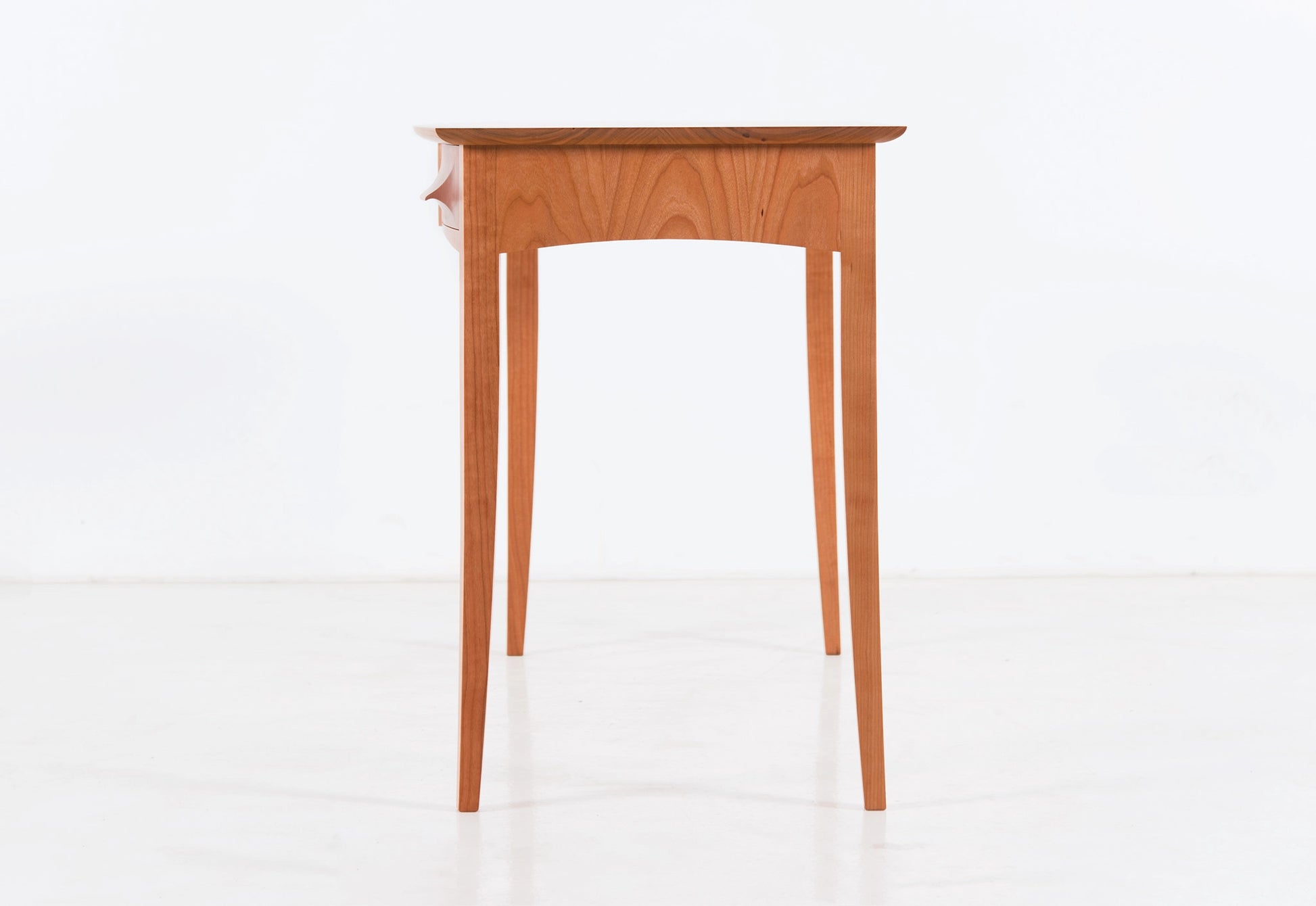 Wooden desk on a white background