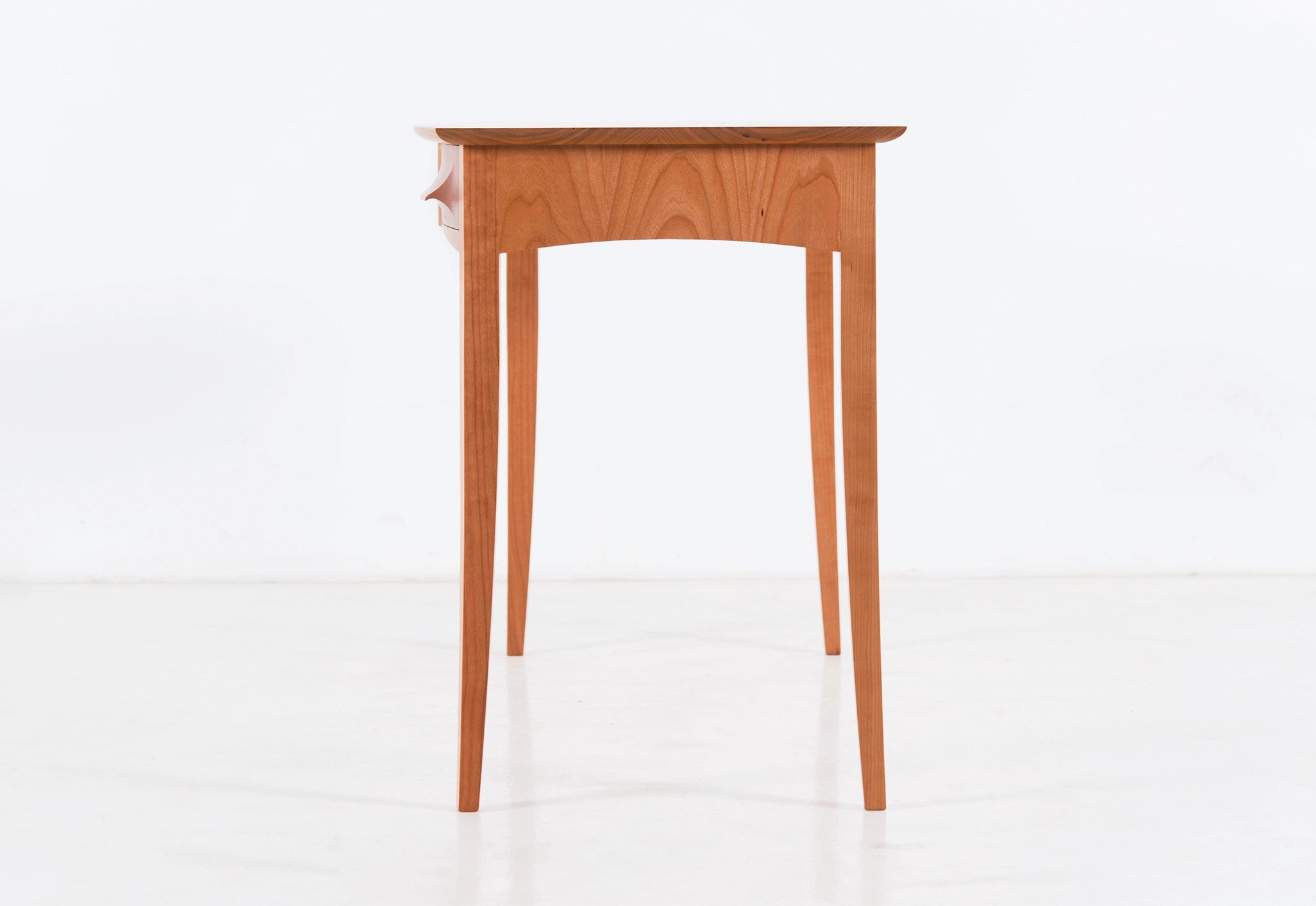 Wooden desk on a white background