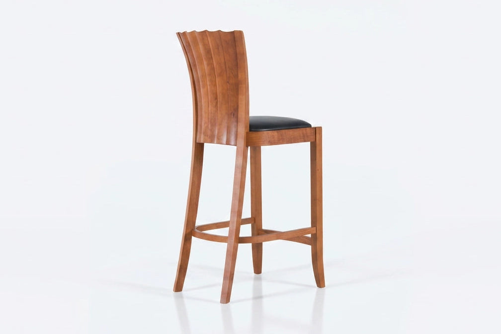 Wooden bar stool with a black seat on a white background