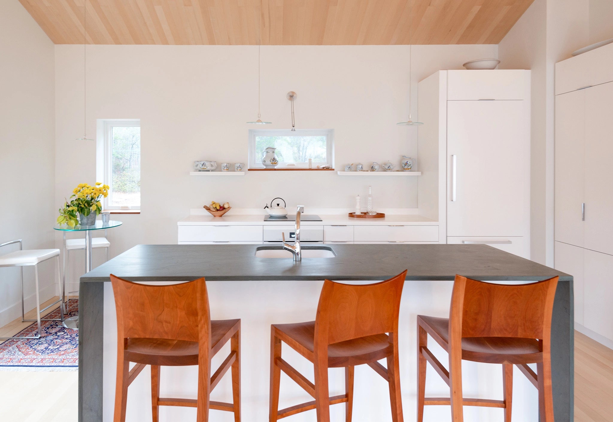 Modern kitchen with a island and chairs