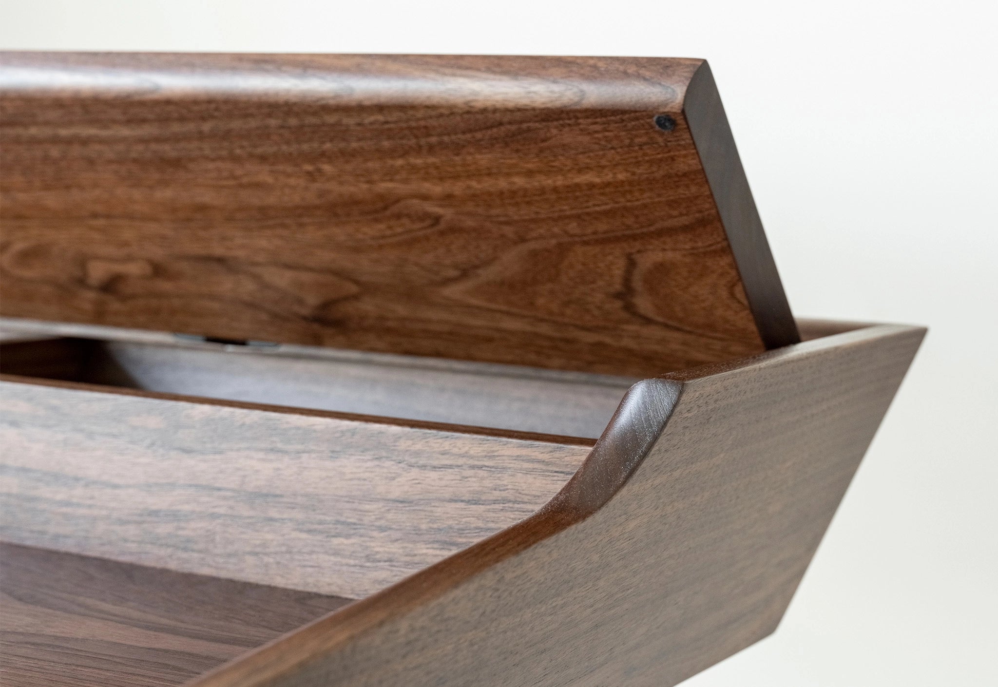 Wooden storage bench with a white background