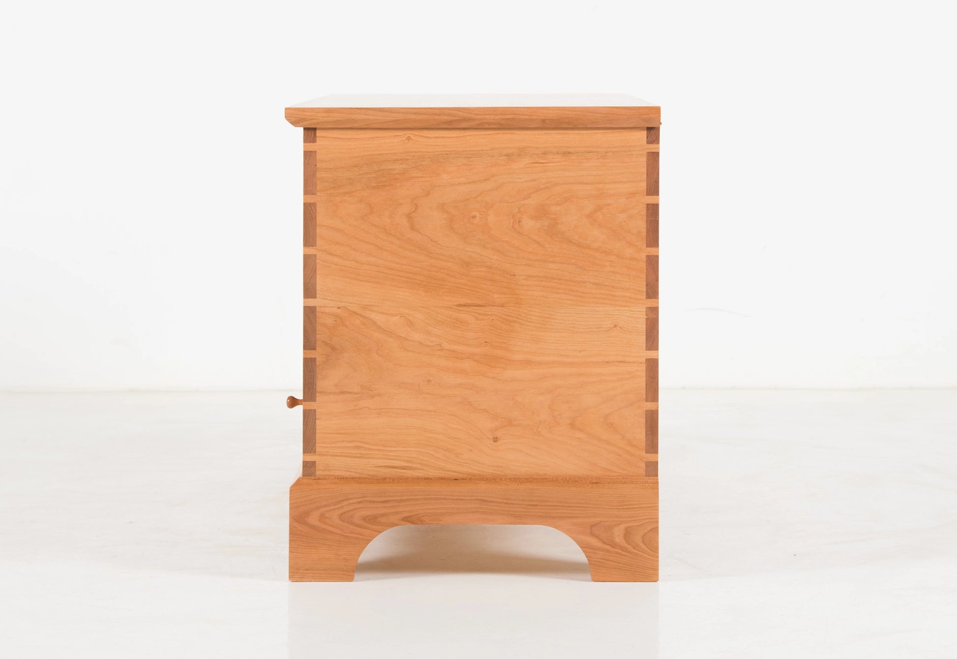 Wooden nightstand on a white background