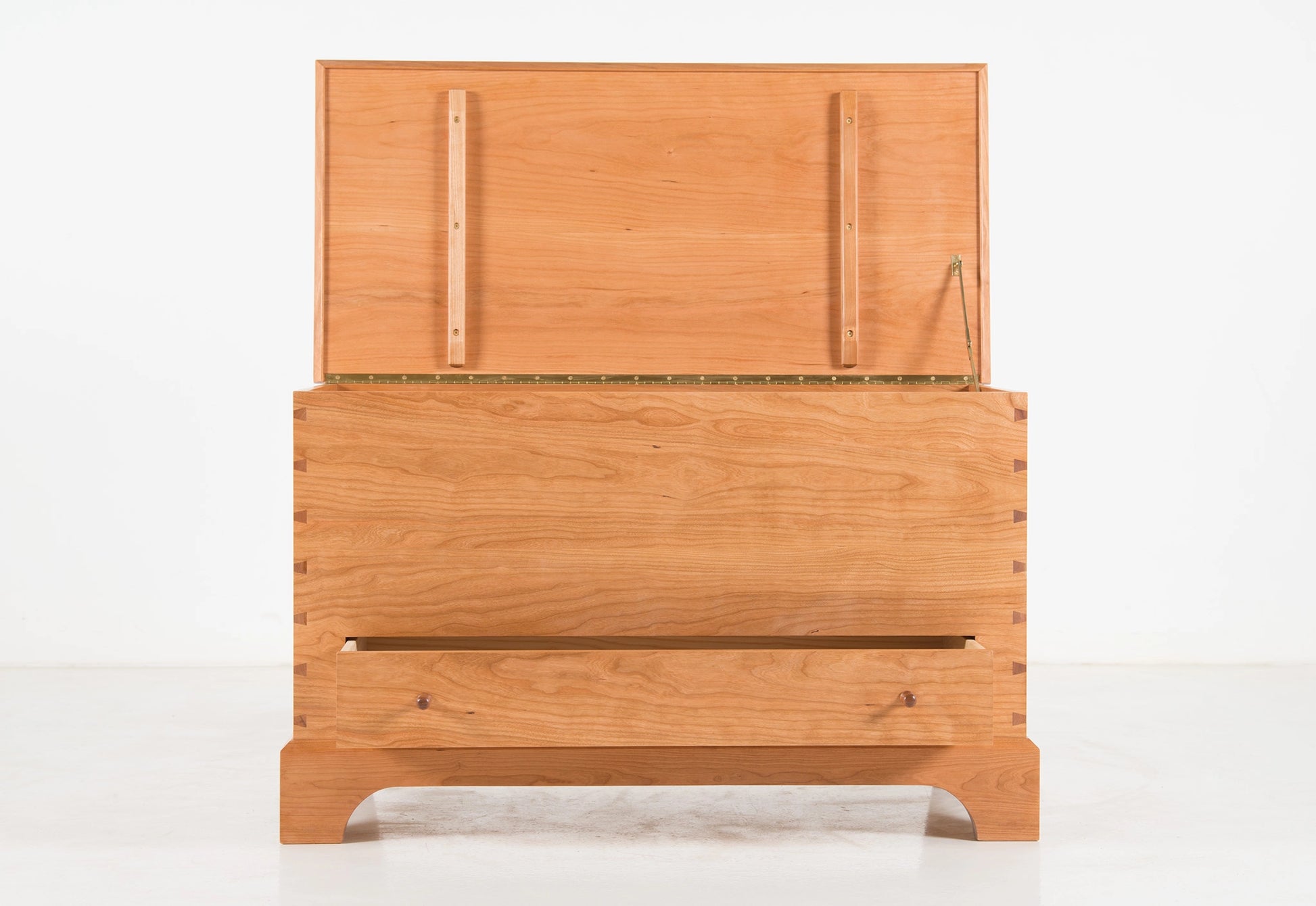 Wooden bed frame with a white background