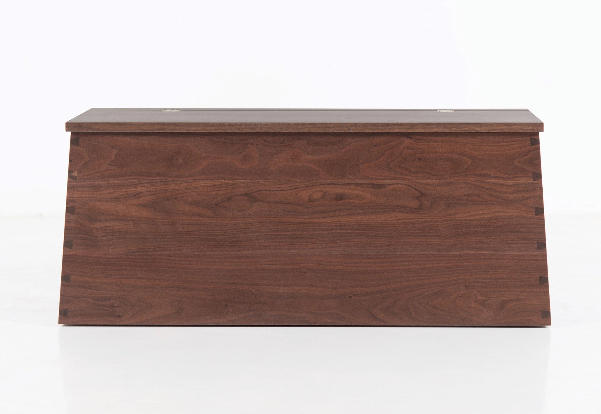 Wooden storage box with a lid on a white background