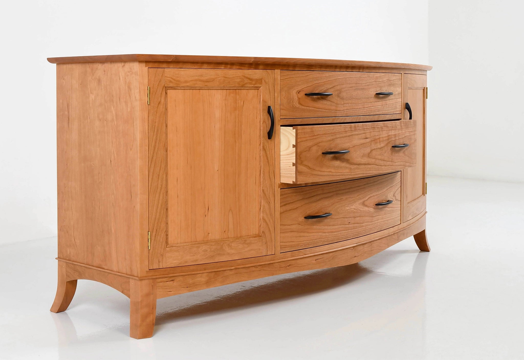 Wooden sideboard with drawers on a white background