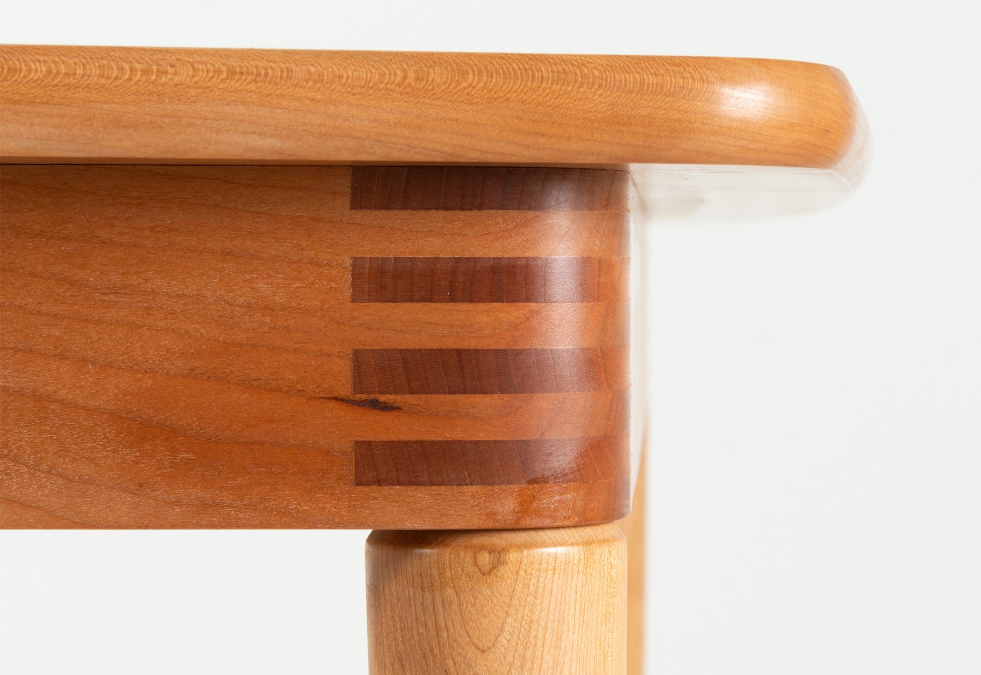 Close-up of a wooden chair with a white background