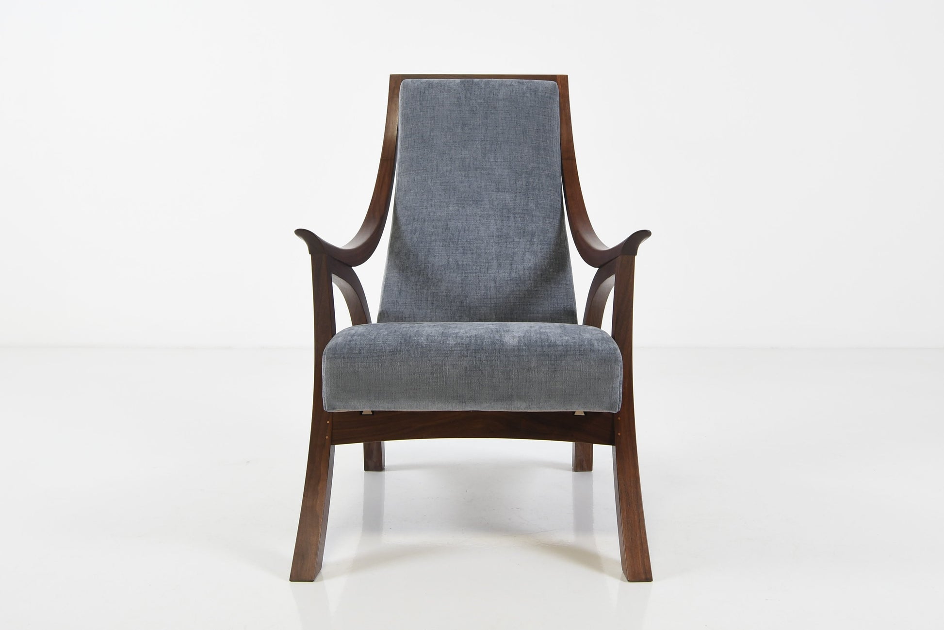 Chair with gray cushion on a white background