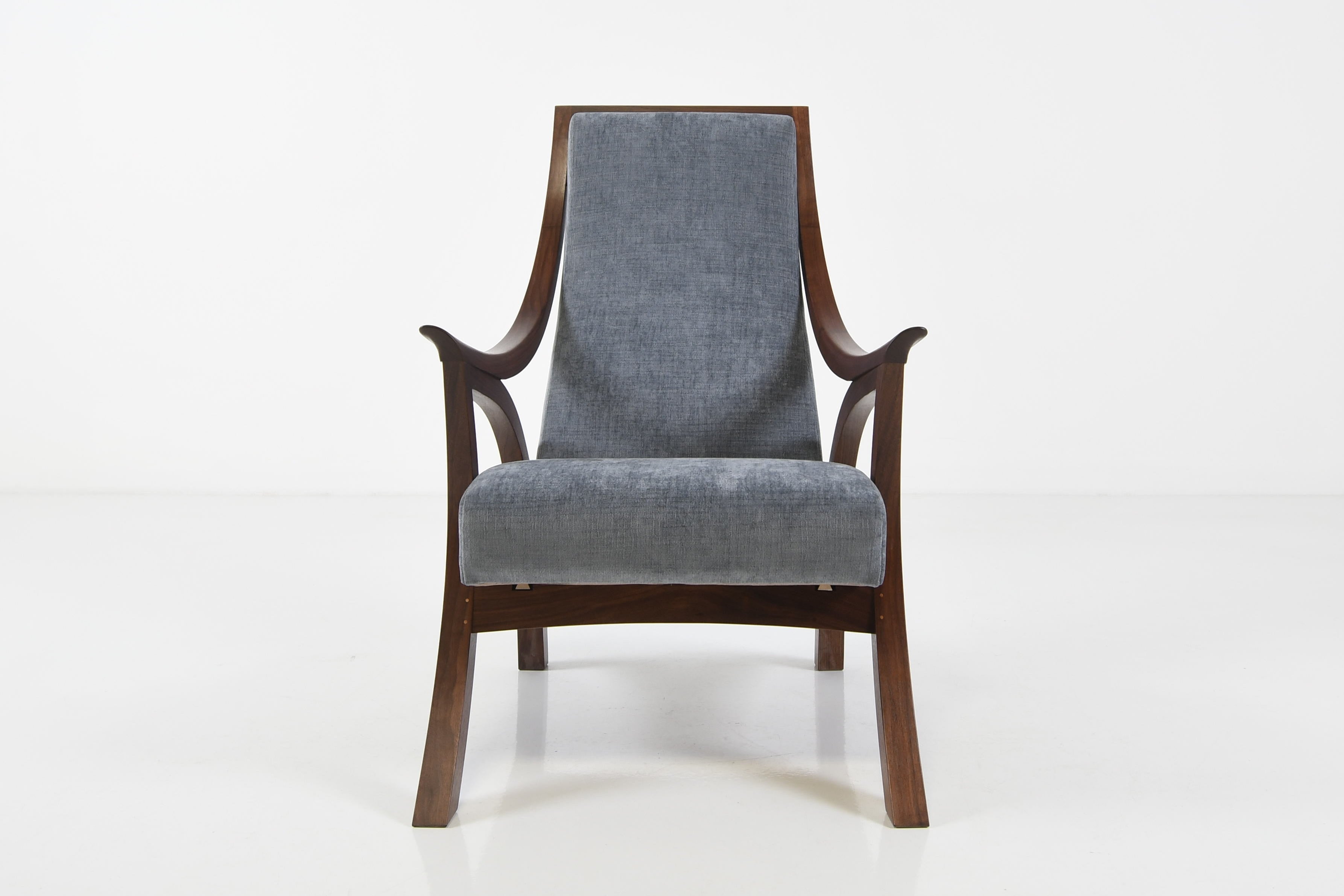 Chair with gray cushion on a white background