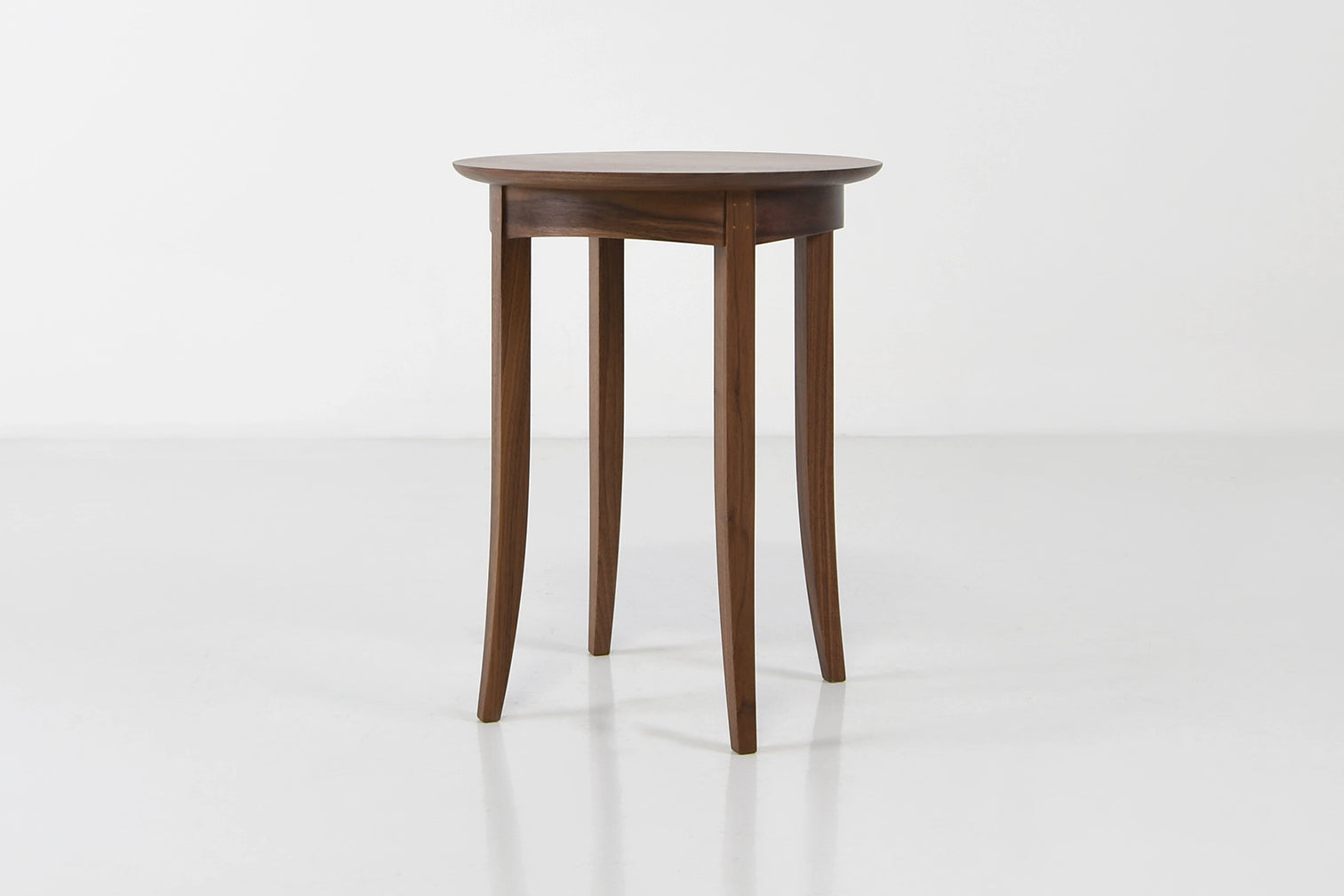 Wooden side table on a white background