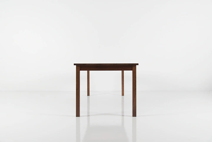 Wooden table on a white background