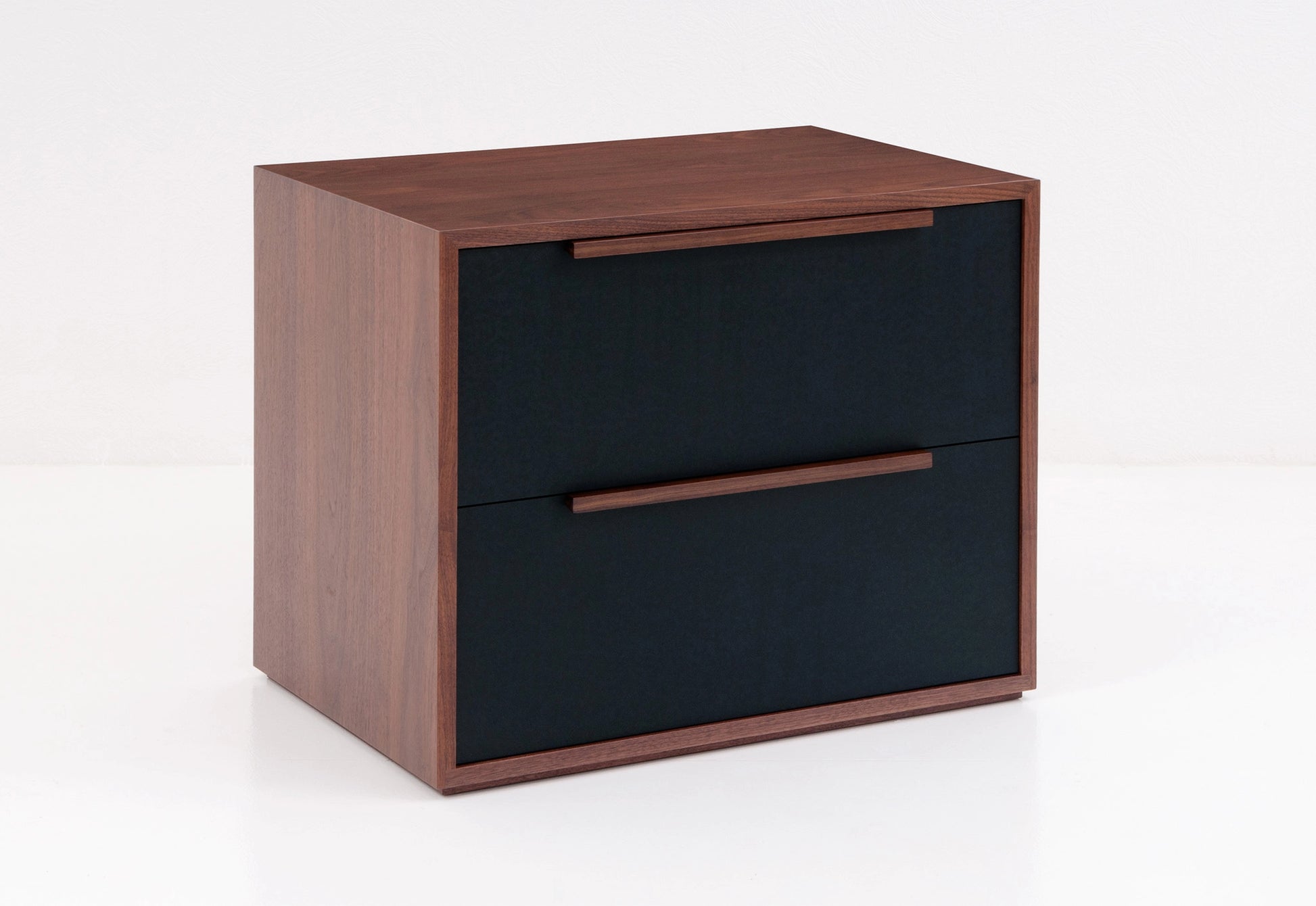 Wooden file case with two drawers on a white background