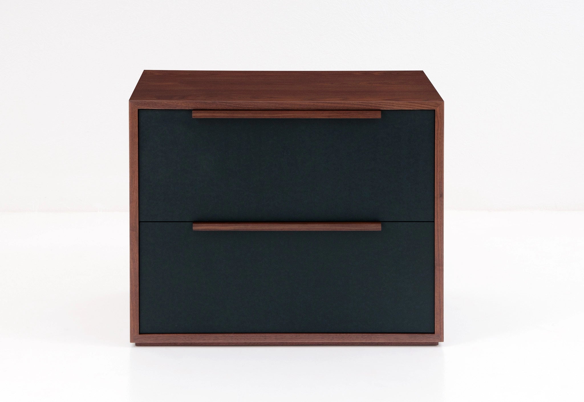 Two-drawer file case with dark leather front and wooden accents on a white background