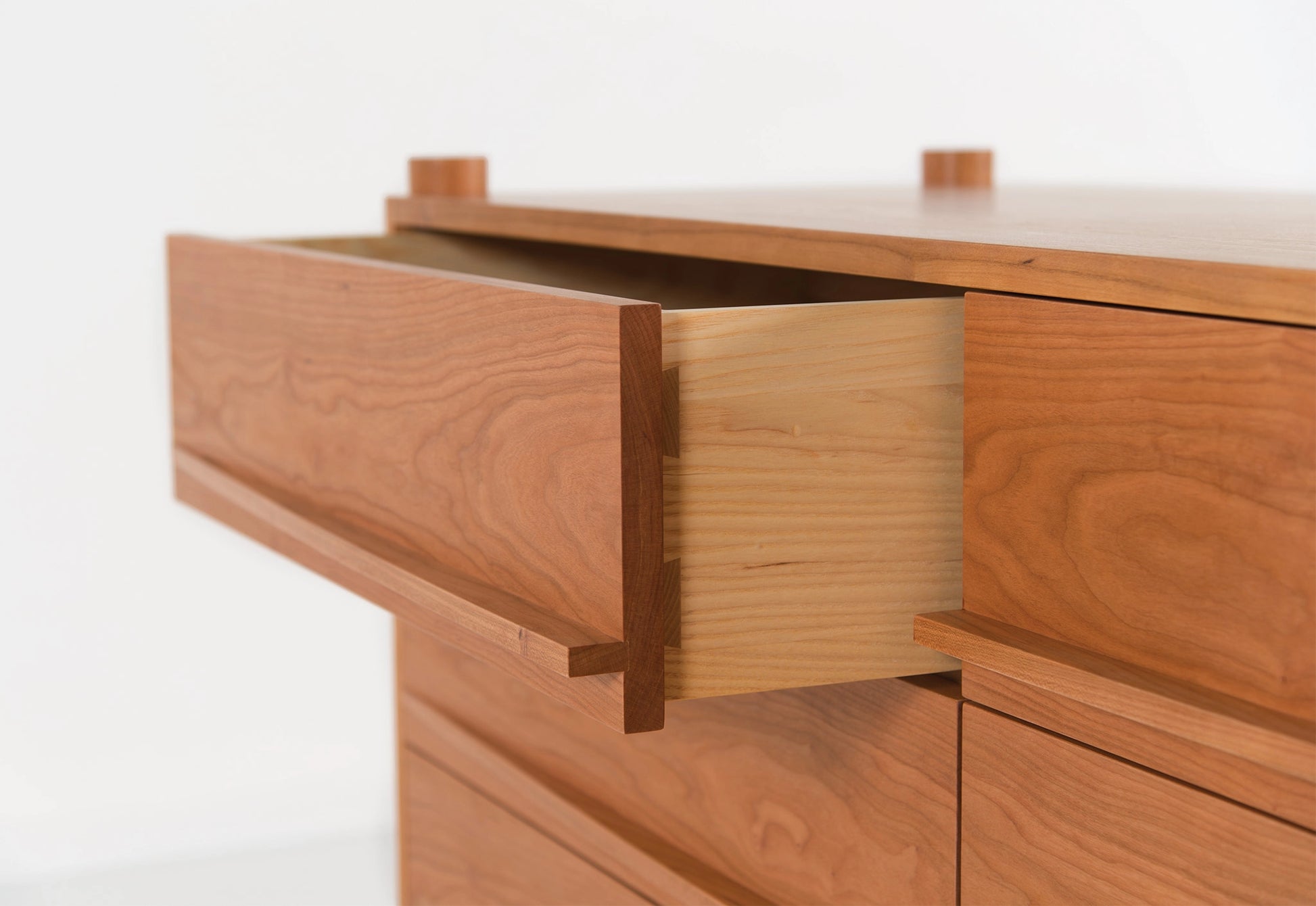 Wooden drawer with a white background