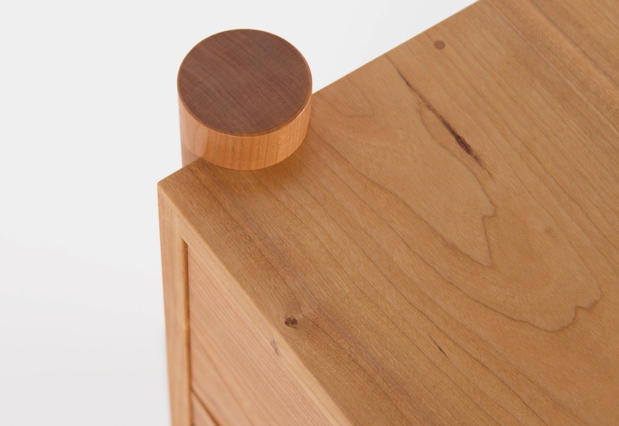 Wooden furniture on a light wood surface