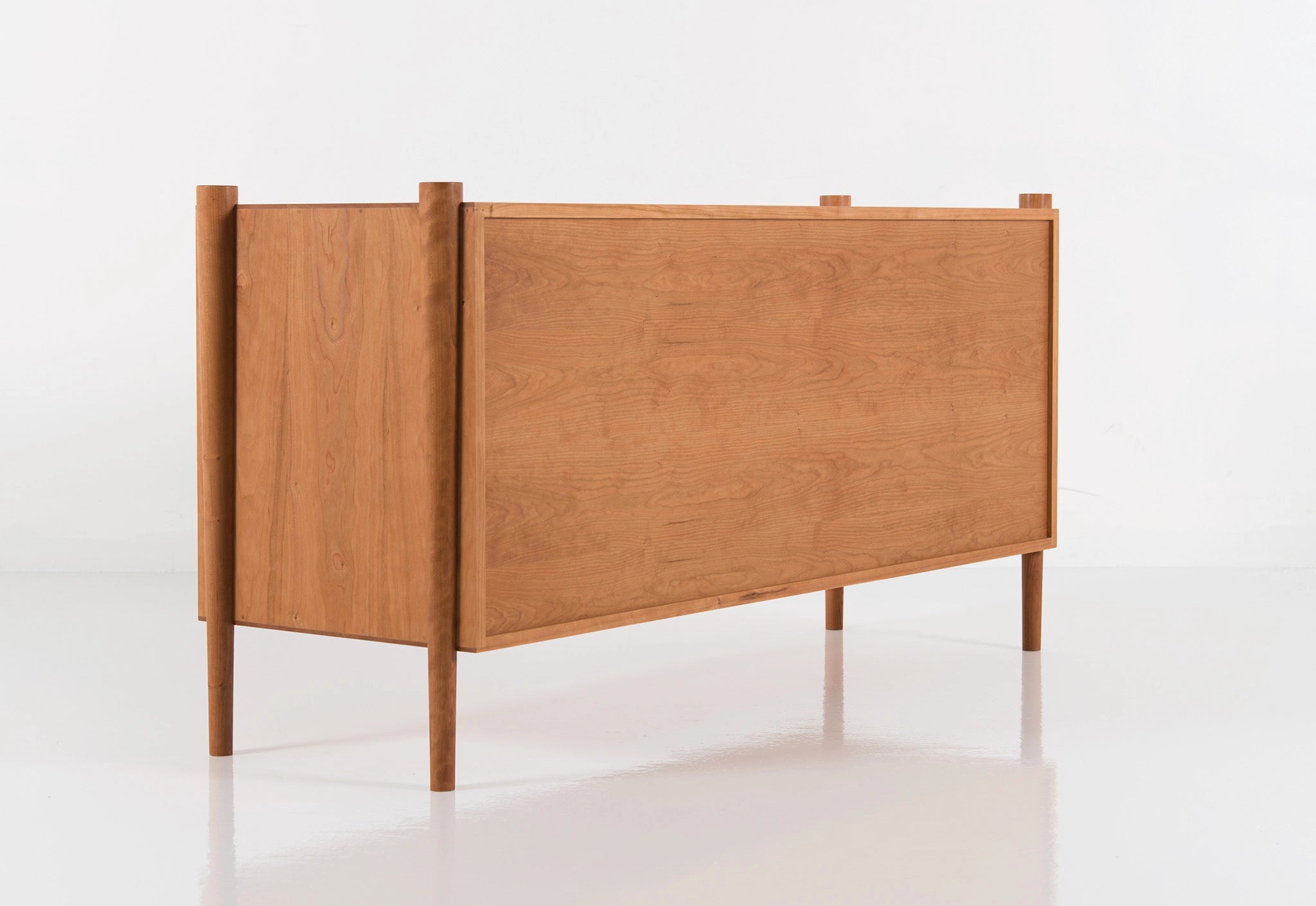 Wooden sideboard on a white background
