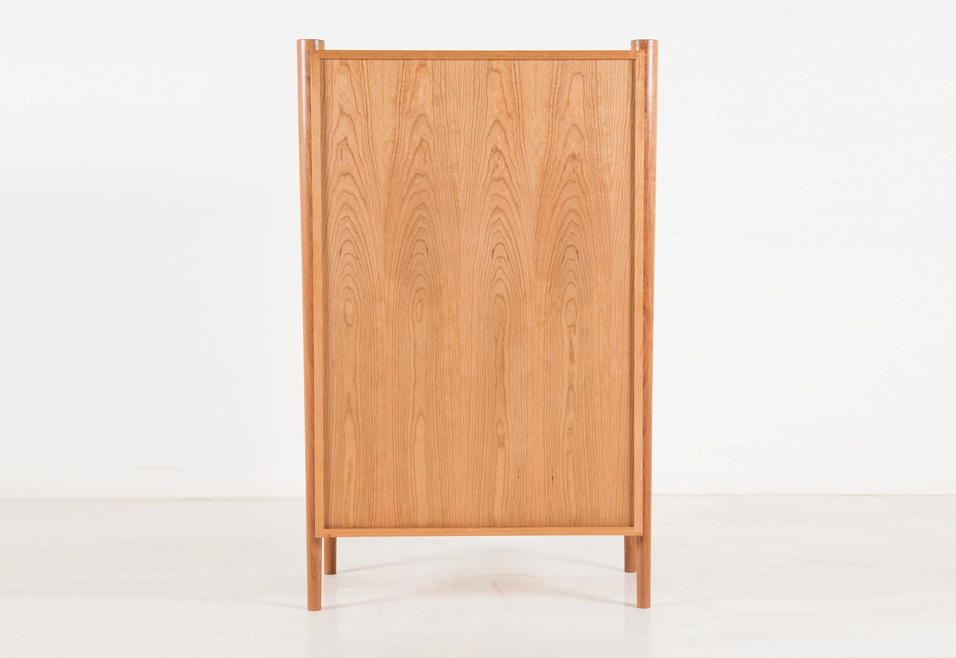 Wooden cabinet with a grid pattern on a white background