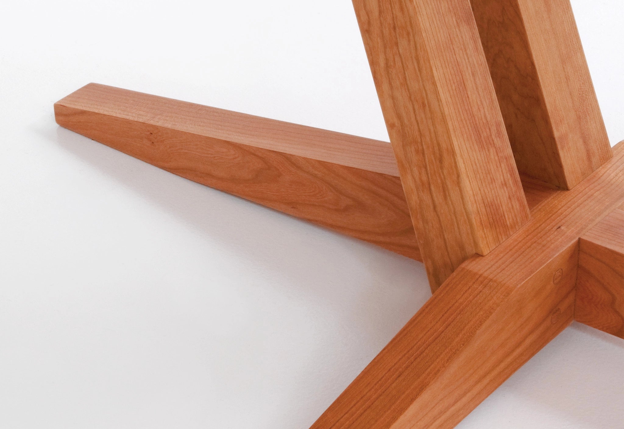 Wooden chair base on a white background