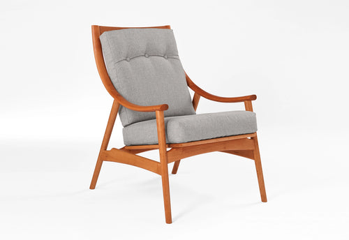 Wooden armchair with gray cushions on a white background