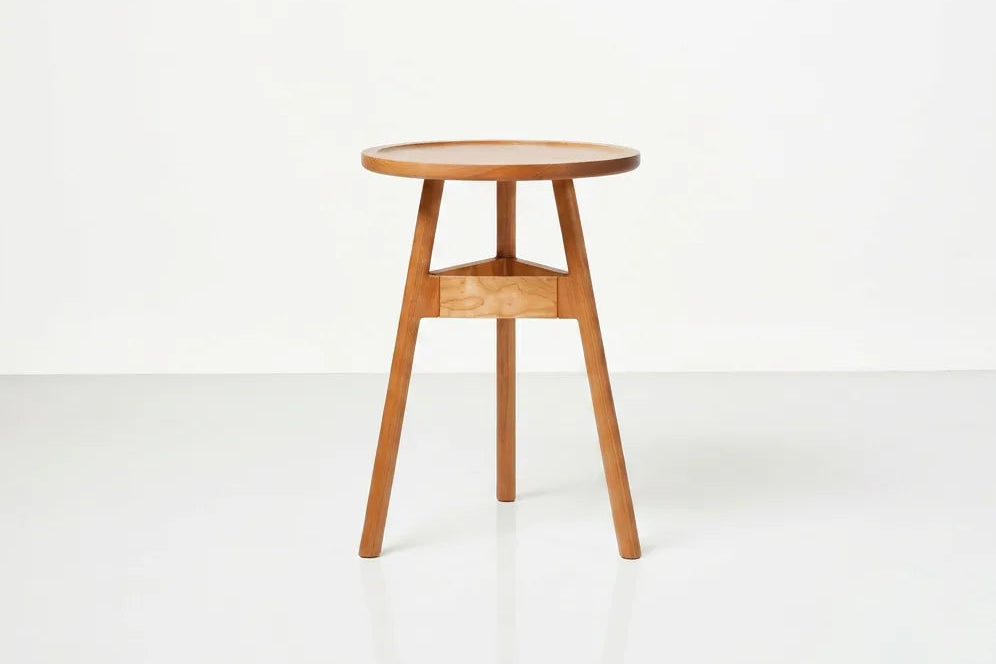 Wooden side table on a white background