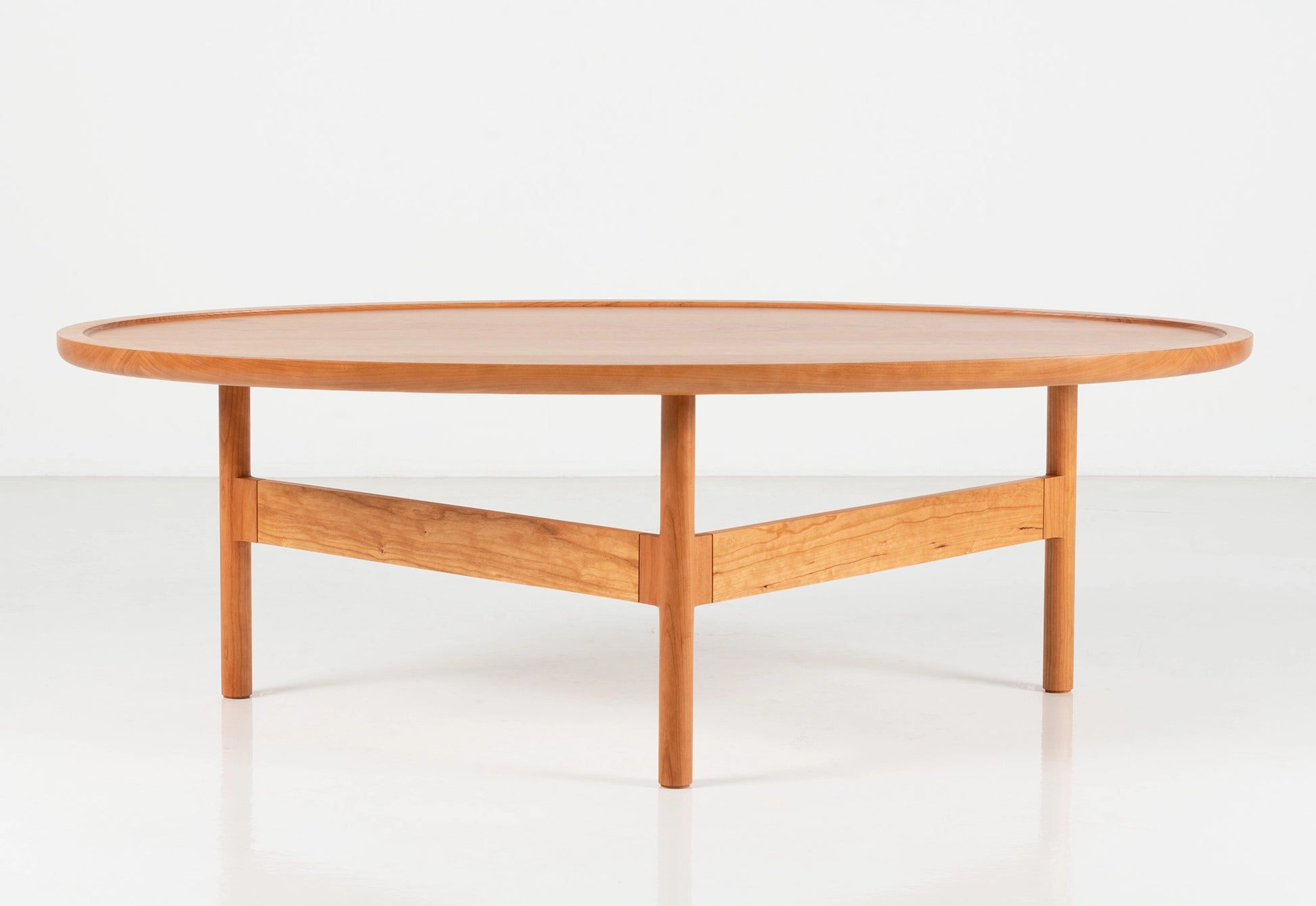 Wooden coffee table on a white background