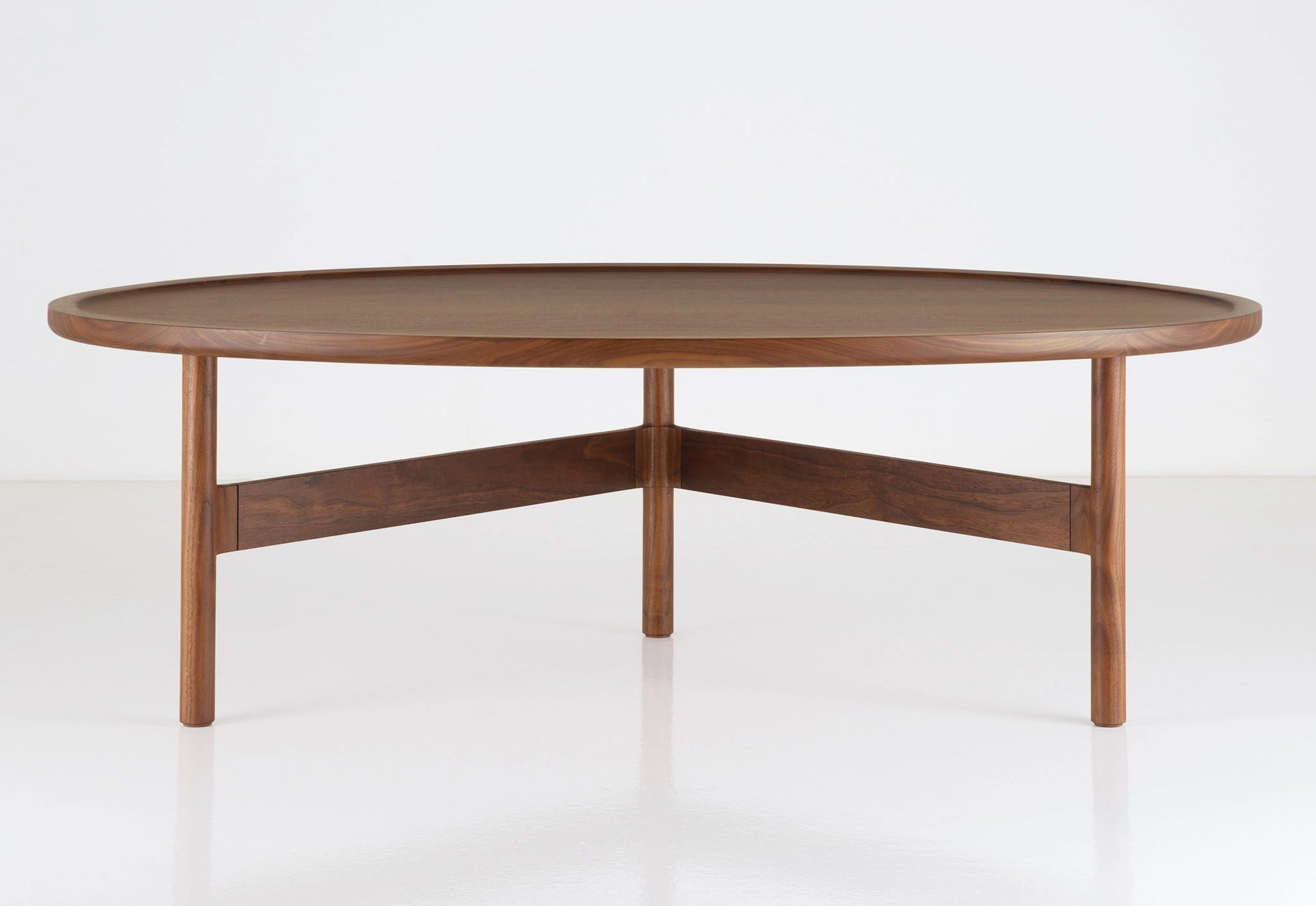 Wooden coffee table on a white background
