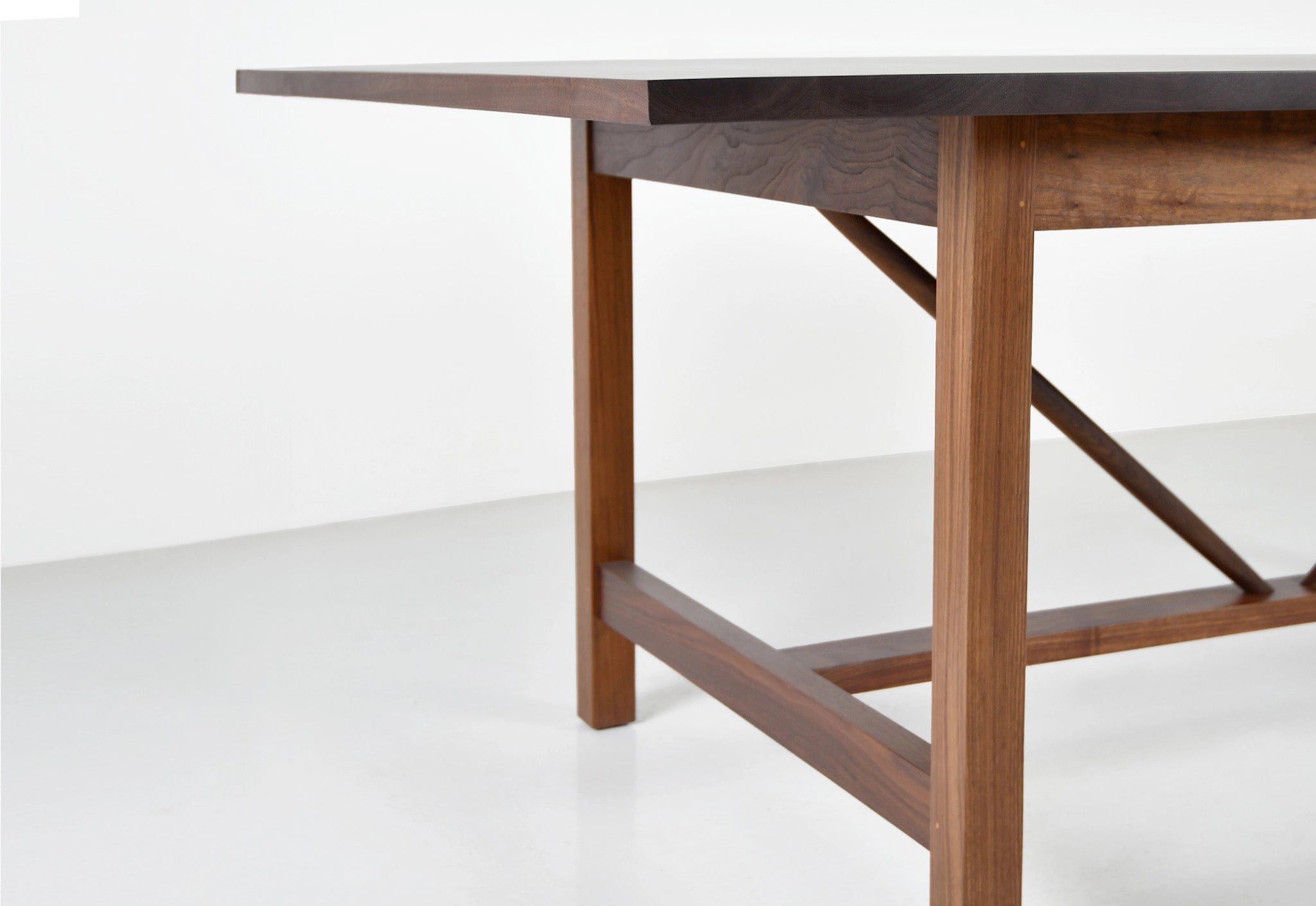 Wooden table with a minimalist design on a white background