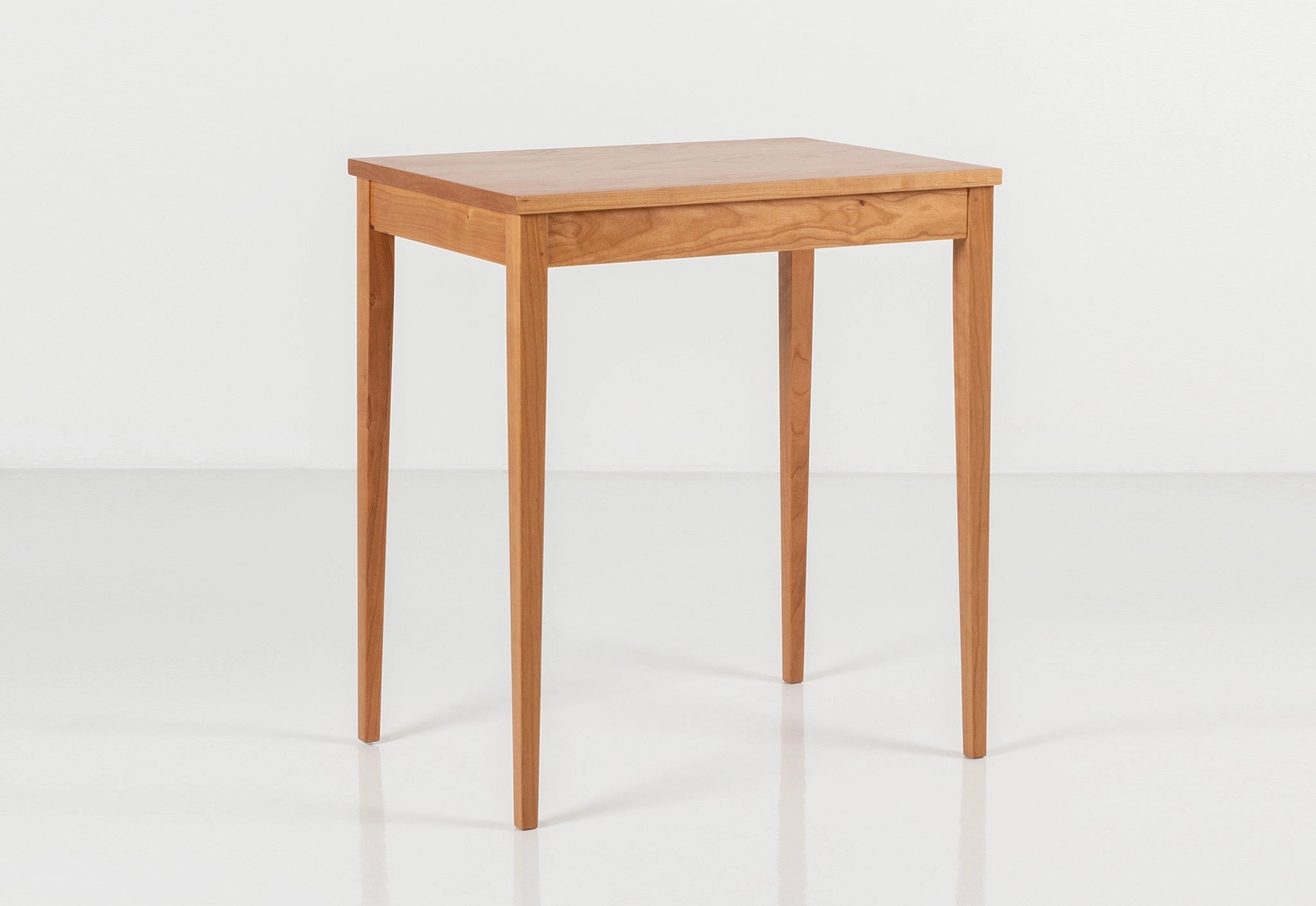 Wooden table on a white background