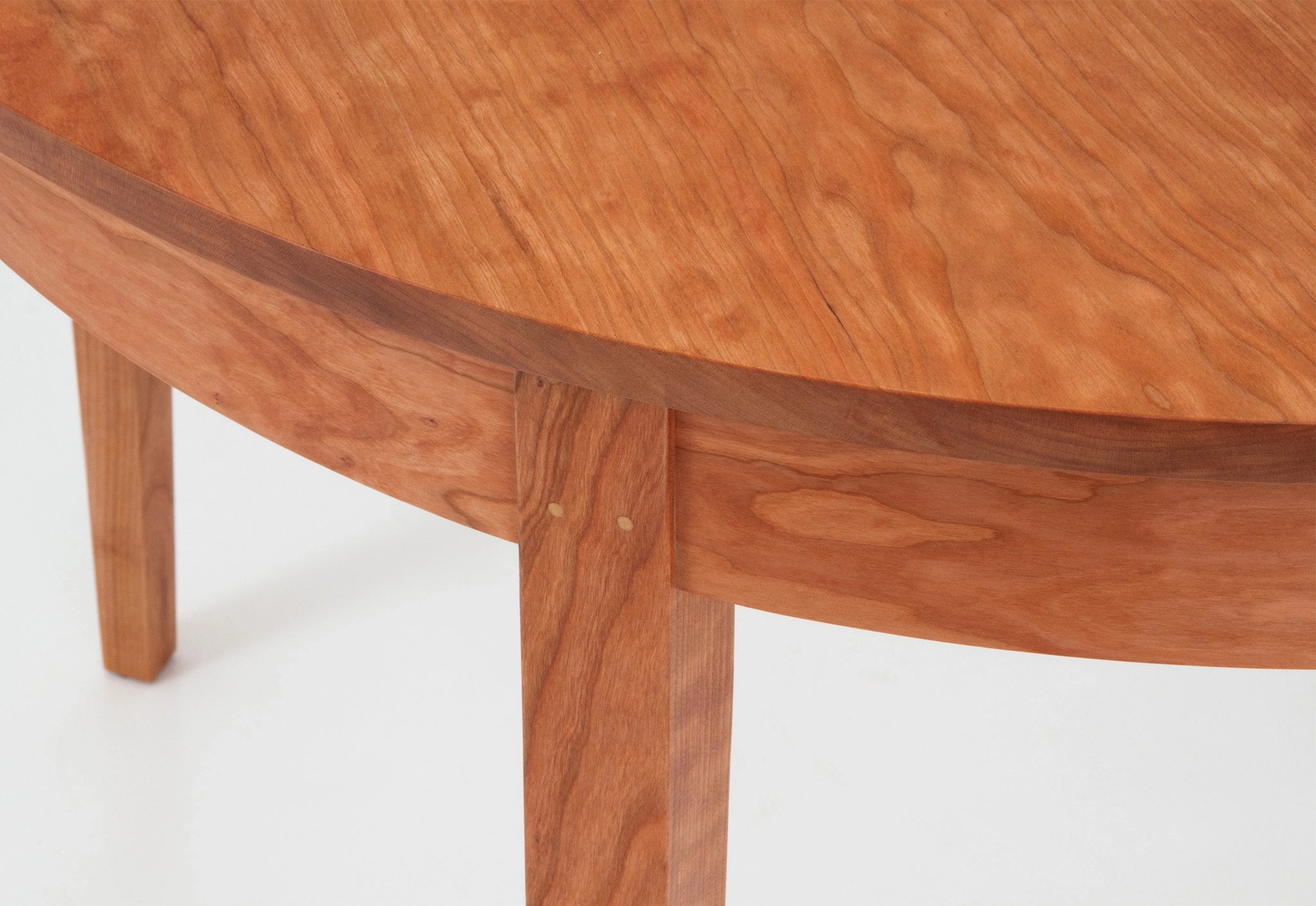 Wooden table with a white background