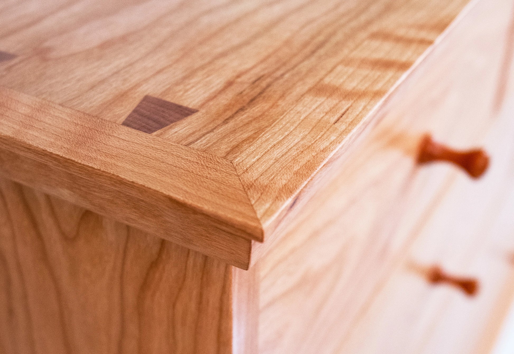 Close-up of a wooden surface with visible grain and texture