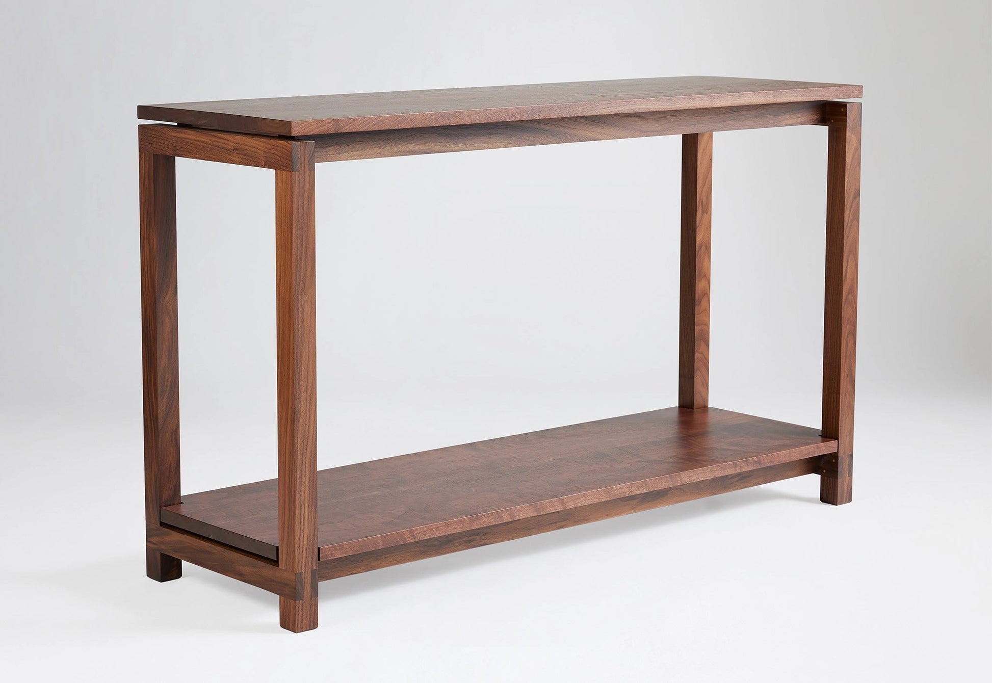 Wooden console table on a white background