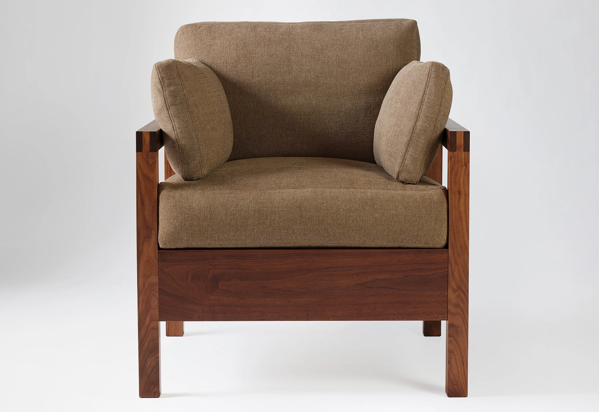 Bonita walnut-frame lounge chair with a cream cushion