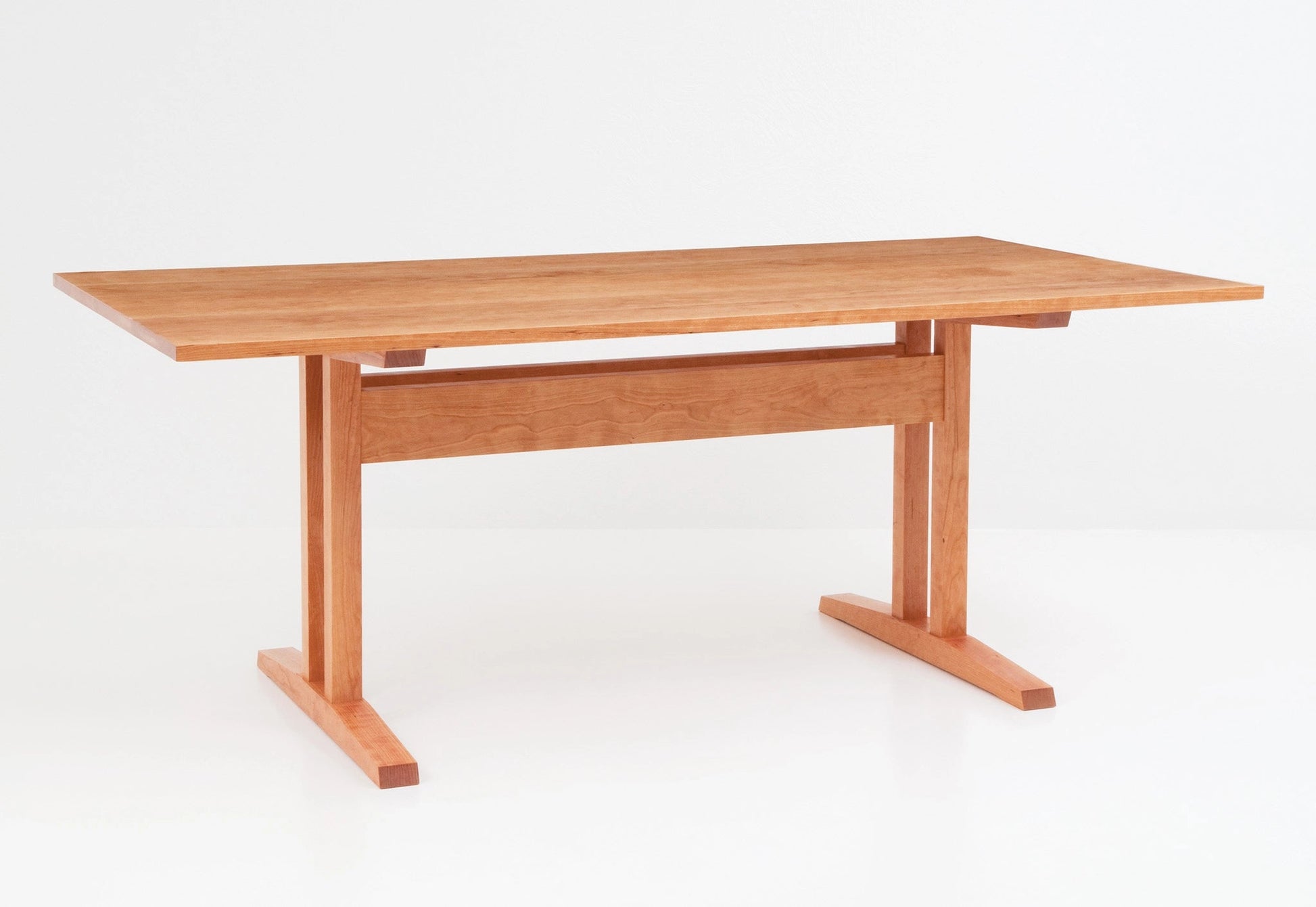 Wooden table on a white background