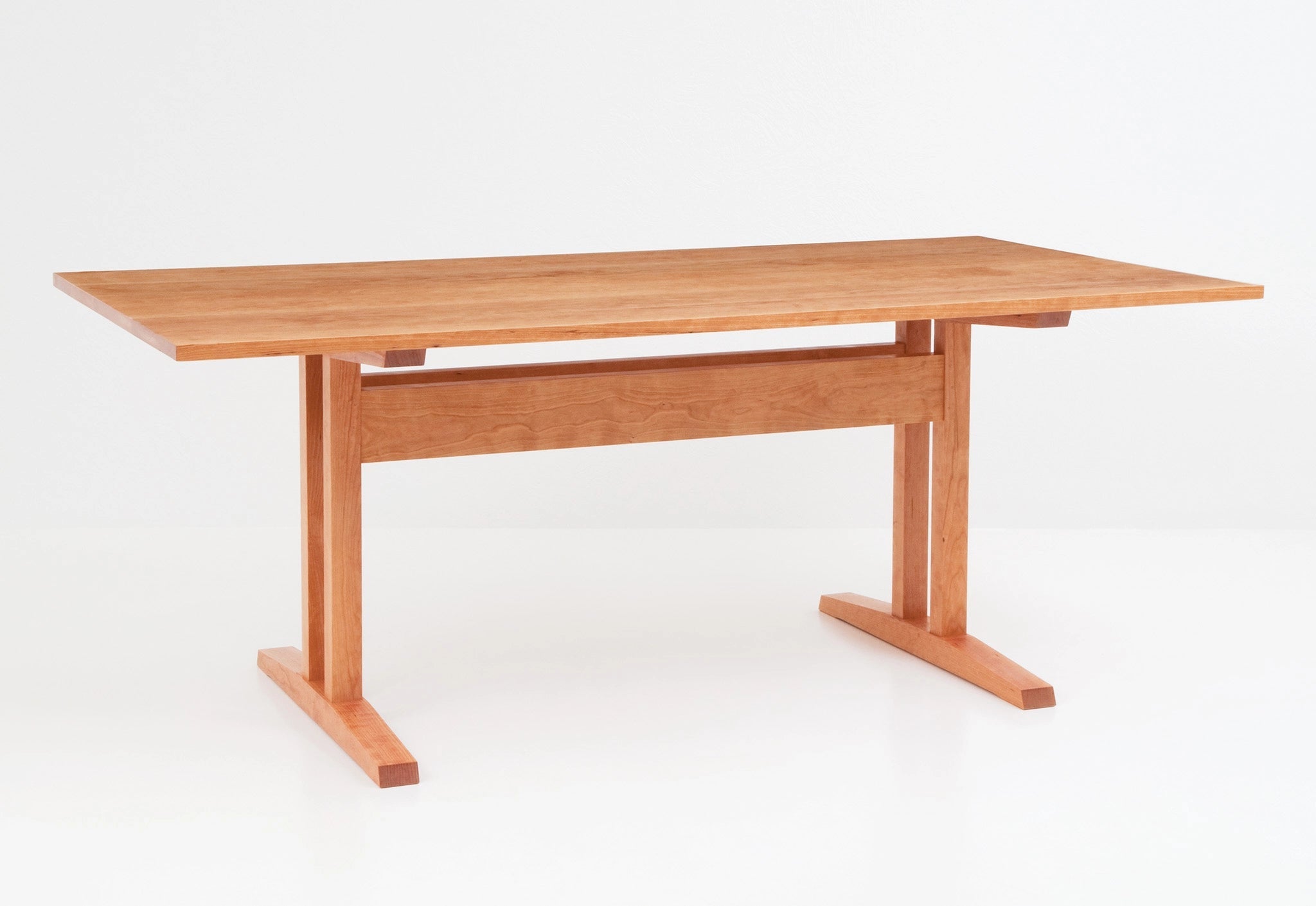 Wooden table on a white background