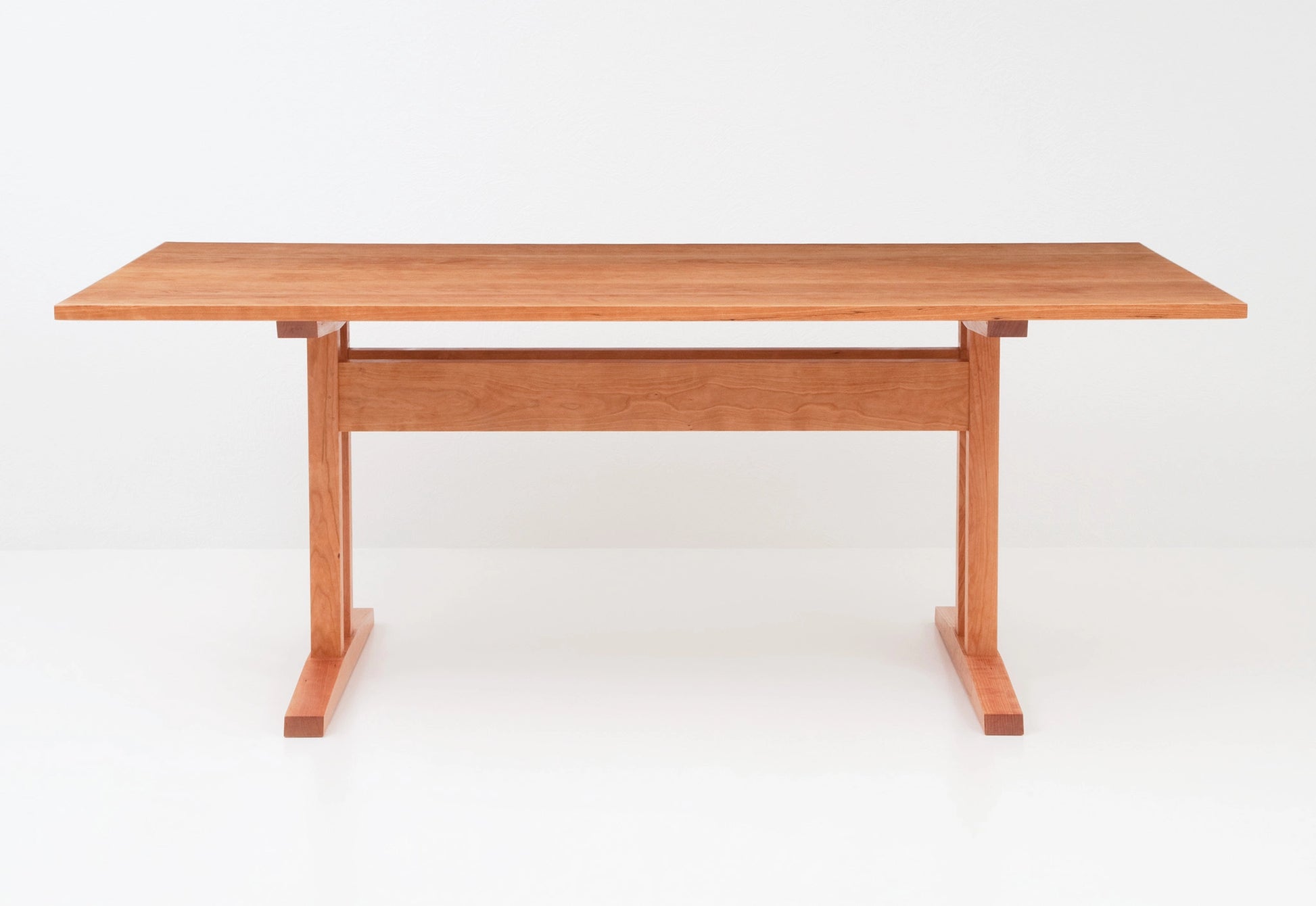 Wooden table on a white background