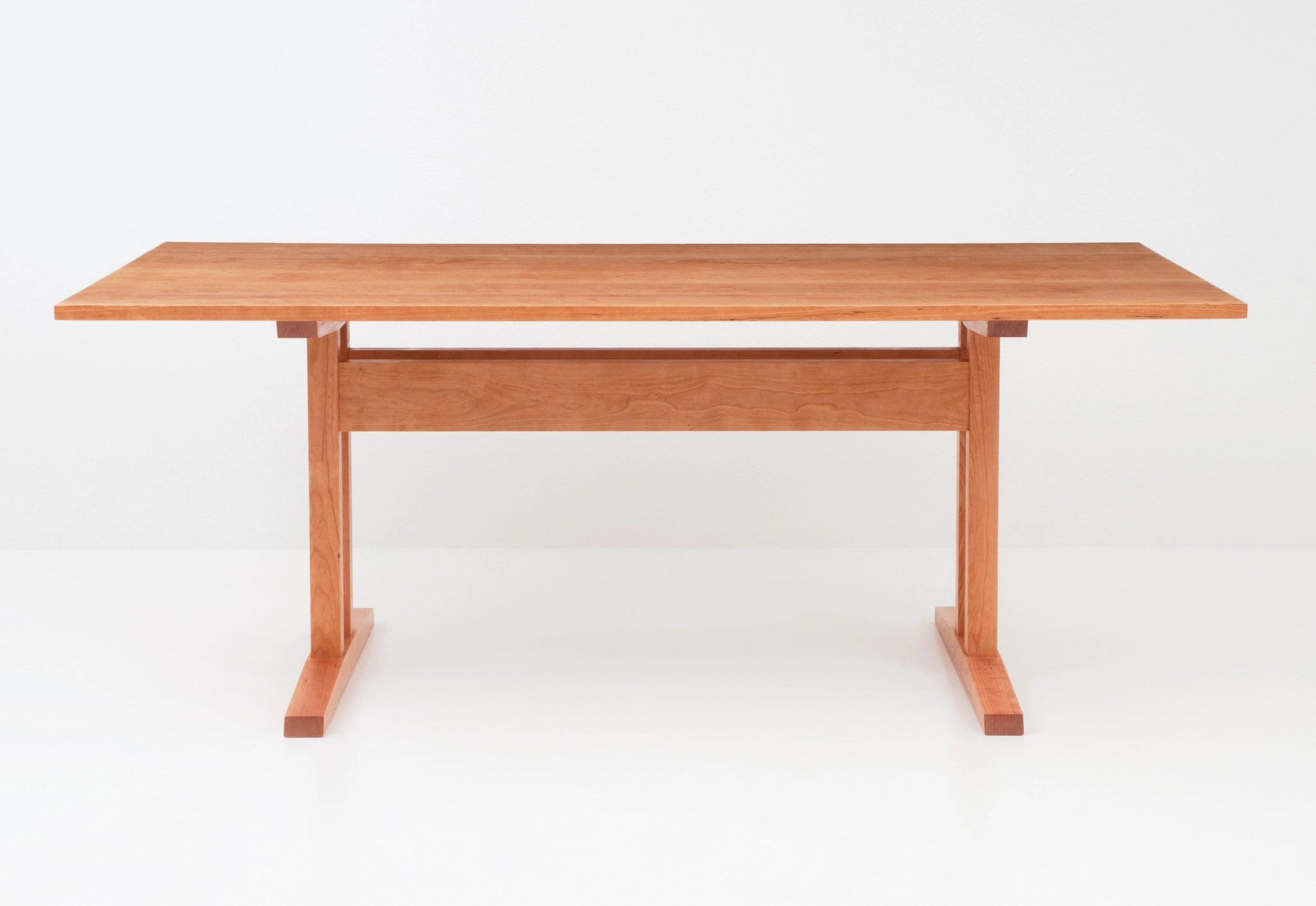 Wooden table on a white background