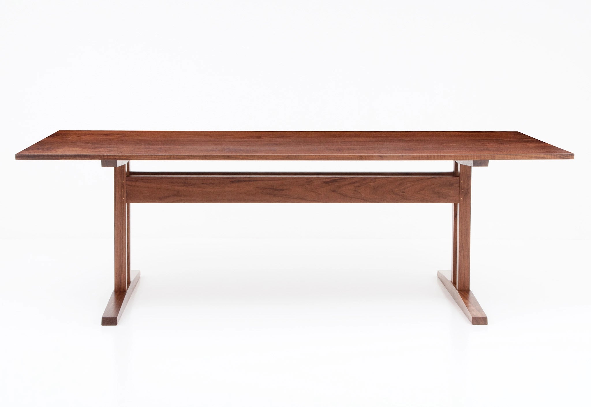 Wooden table on a white background