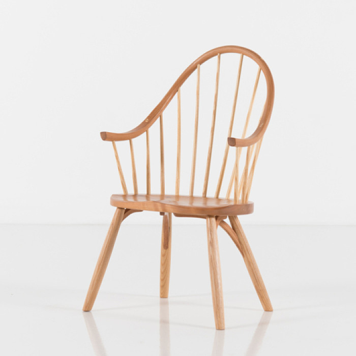 childs wooden chair with arms