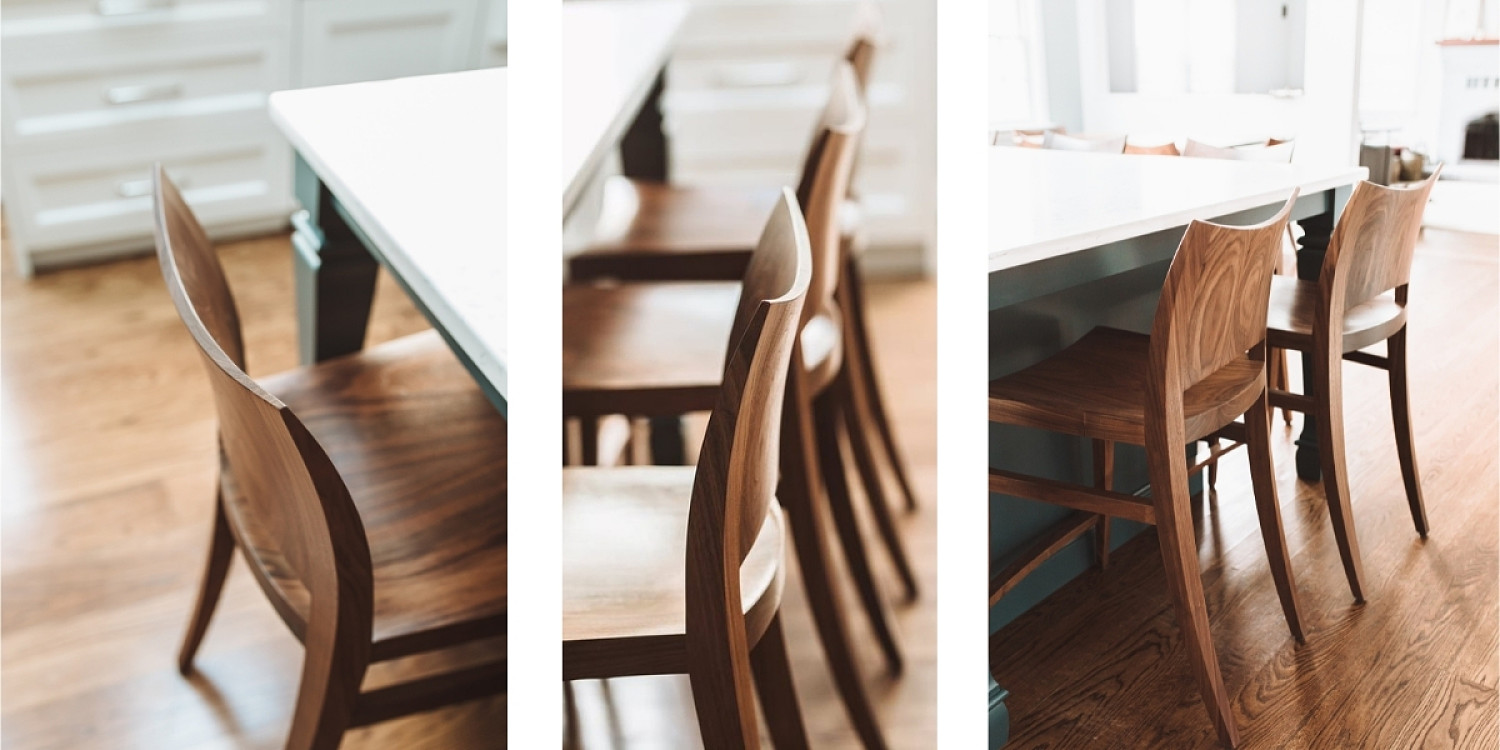 Side profiles of auburn stools at kitchen counter
