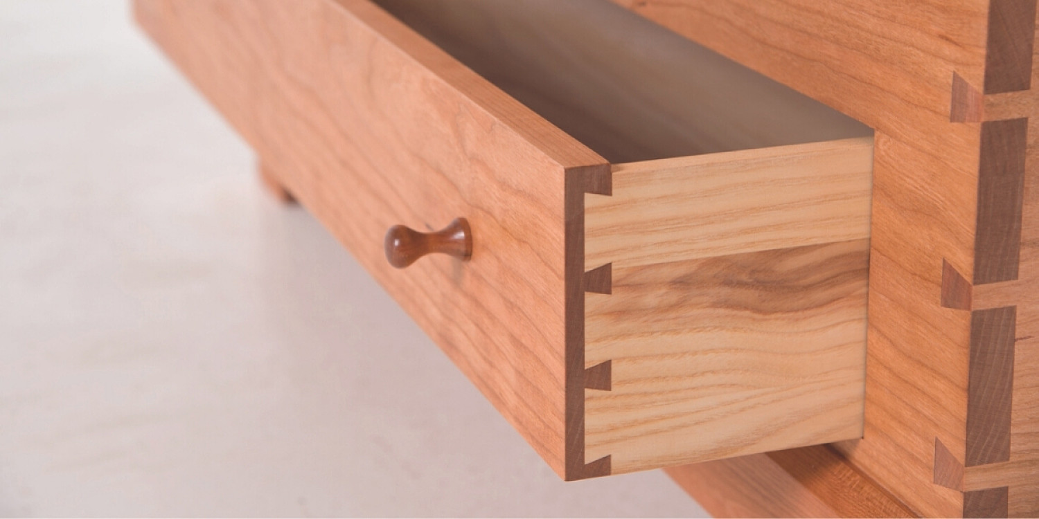 Drawer detail of Blanket Box drawer in cherry