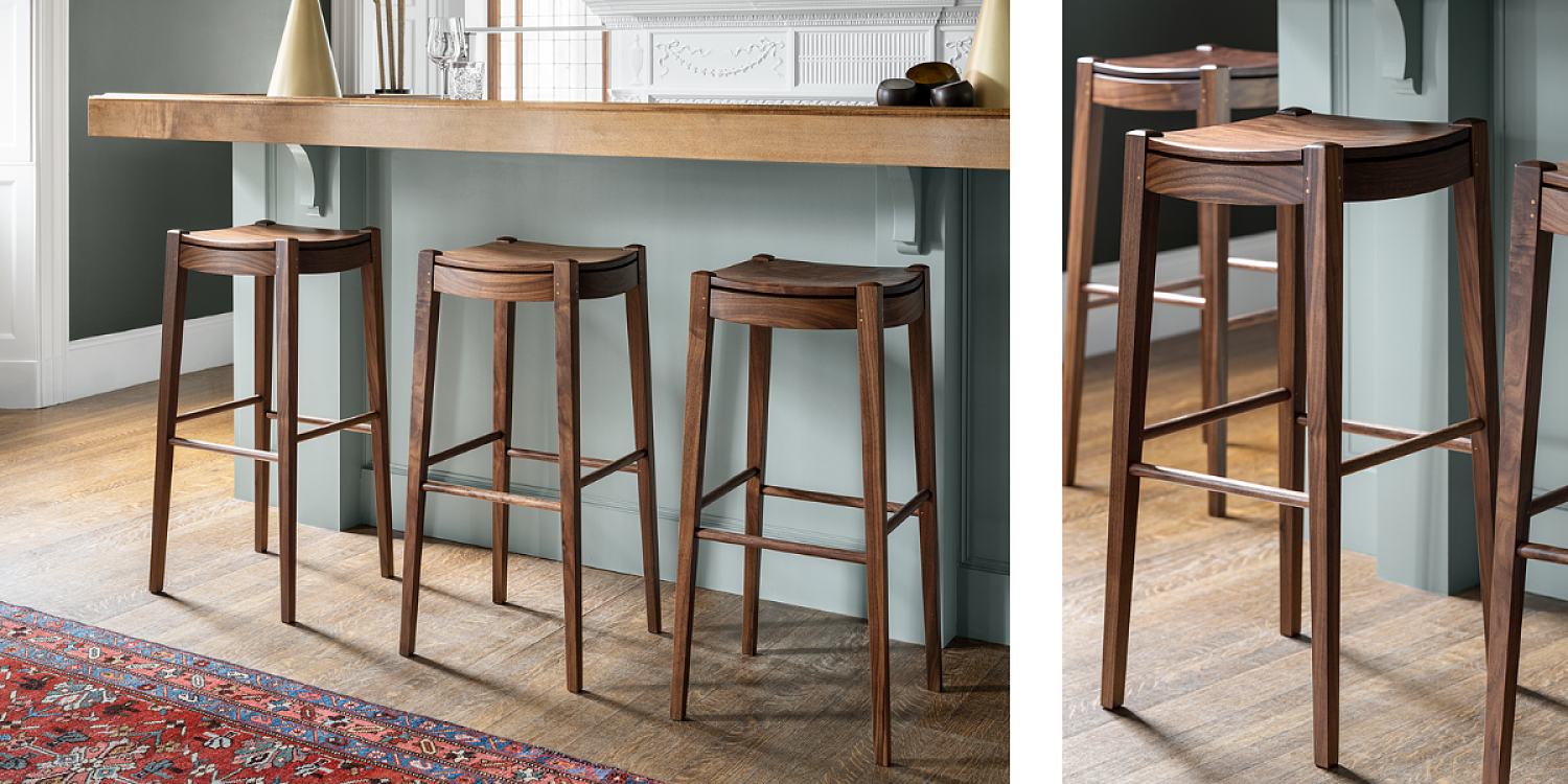 walnut stools a gold and green bar
