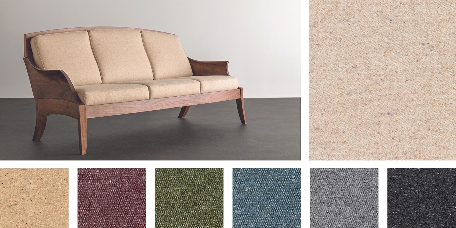 Wing Three Place sofa surrounded by upholstery swatches
