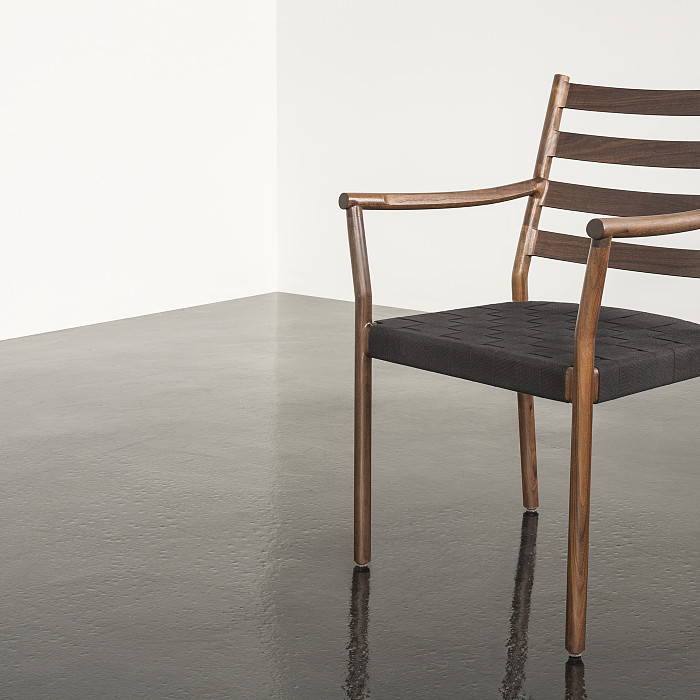 Hancock Arm Chair with Black Shaker table on a black and white background.