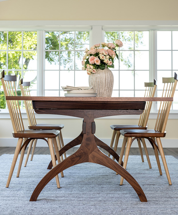 Wishbone Table and Eastward Side Chairs in walnut in dining room