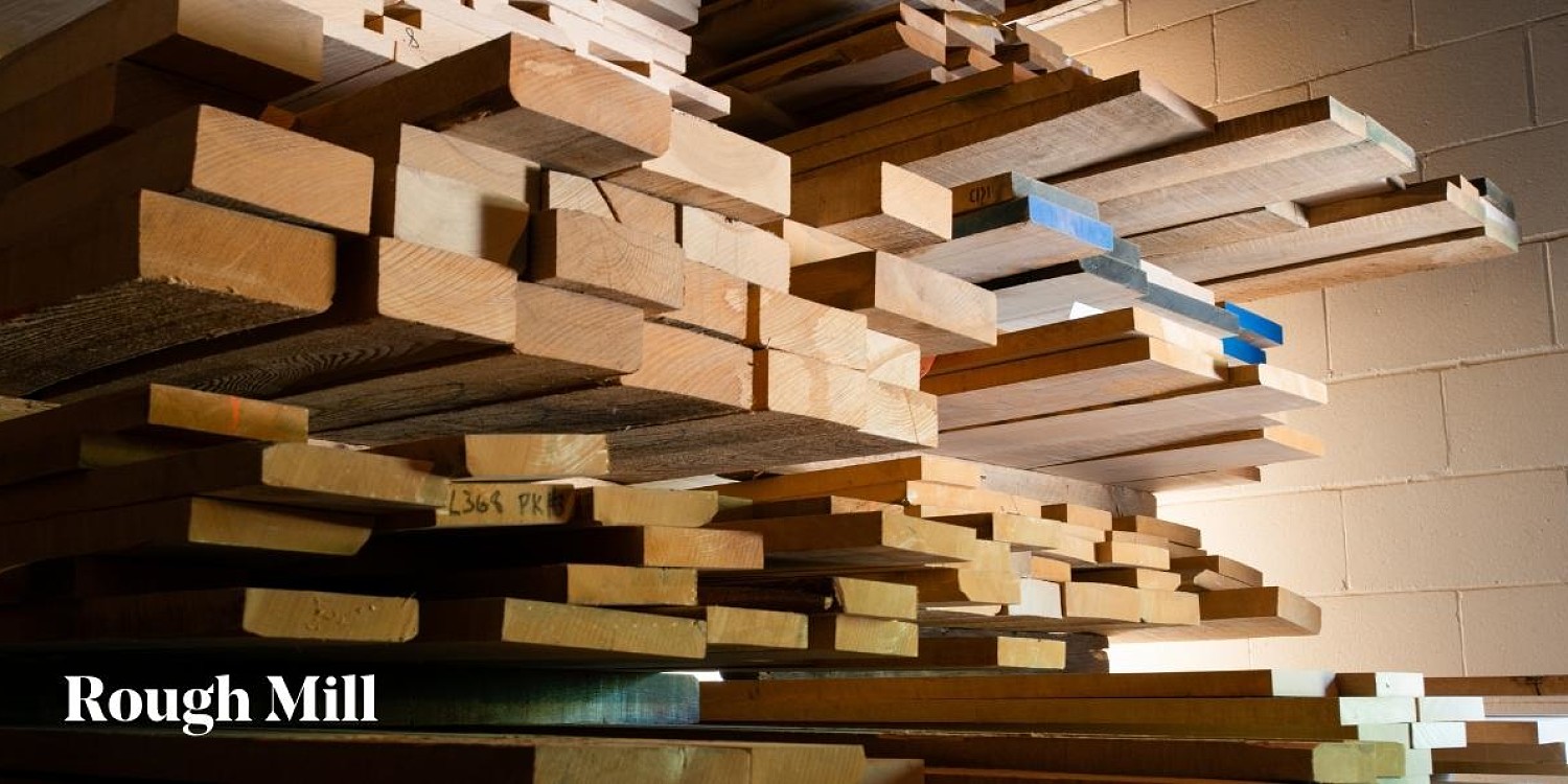 Stacks of lumber with Rough Mill title